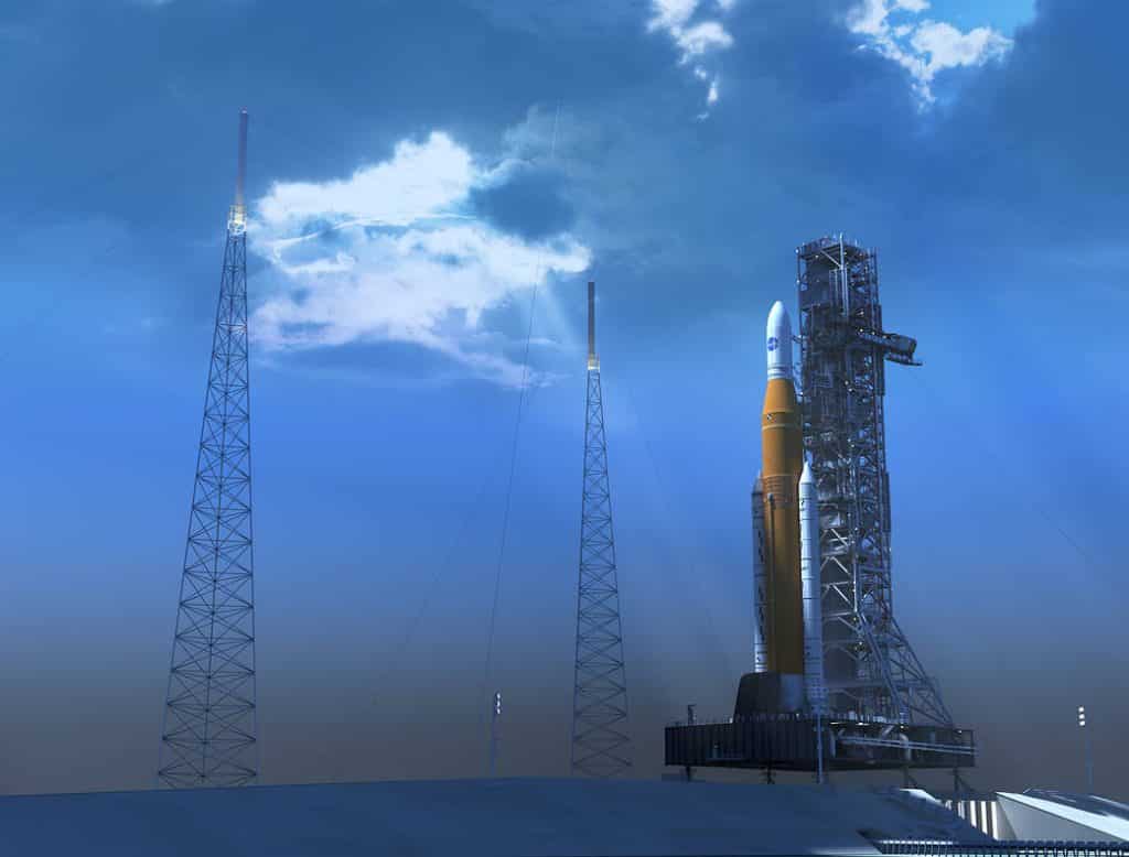 صورة توضح صاروخ نظام الانطلاق الفضائي Sls في ارتفاعه الكامل على منصة الإطلاق. 