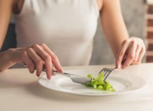 Woman Not Eating Enough مجلة نقطة العلمية