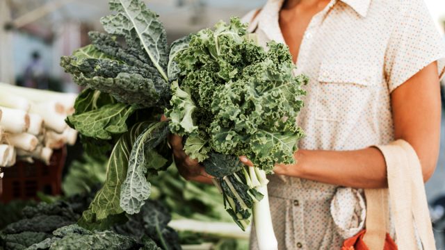 Woman Picking Kale Leeks Farmers Market Grocery Store مجلة نقطة العلمية