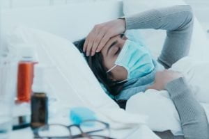 Woman Sick Fever Face Mask Bed Temperature مجلة نقطة العلمية