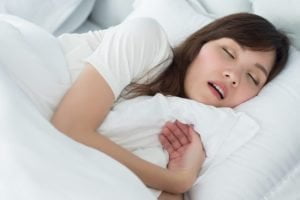 Woman Sleeping Snoring Apnea مجلة نقطة العلمية