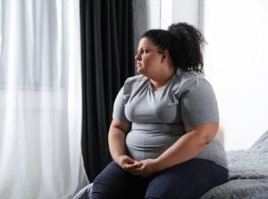 Obese Overweight Woman Sad مجلة نقطة العلمية