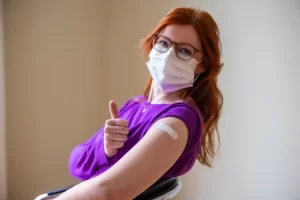 Woman Vaccination Bandaid Vaccine Thumb Up مجلة نقطة العلمية